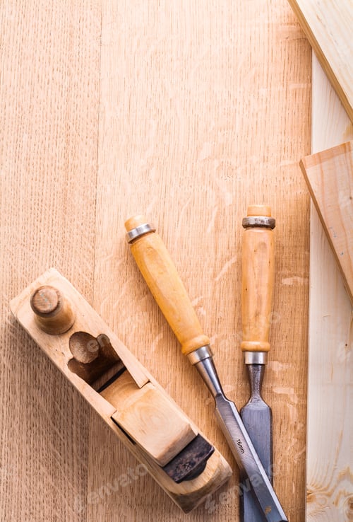 Preview: Plane And Chisels On Wooden Board