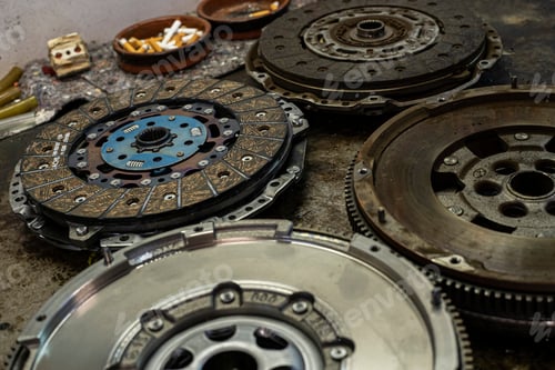 Preview: Detail Of Car Flywheel And Clutch In A Workshop, Car Spare Parts Old And New