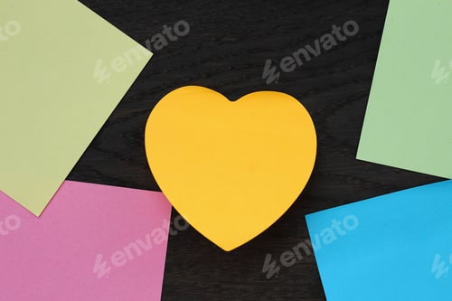 Preview: Heart-Shaped Sticker On A Black Wooden Background With Elements Of Classic Stickers In The Corners