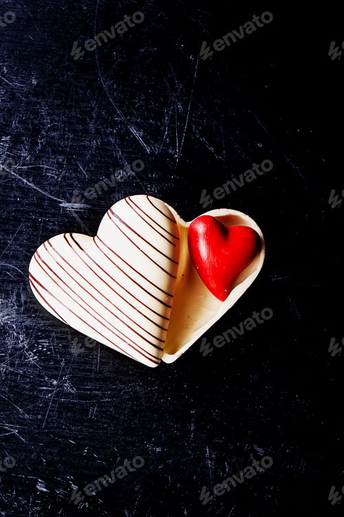 Preview: St Valentine'S Heart Shaped Decorations On Rustic Black Background. Top View