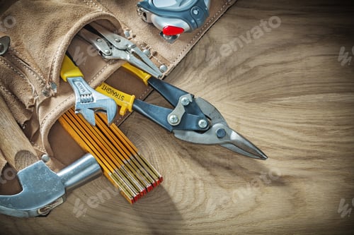 Preview: Tool Belt With Construction Tooling On Wooden Board.
