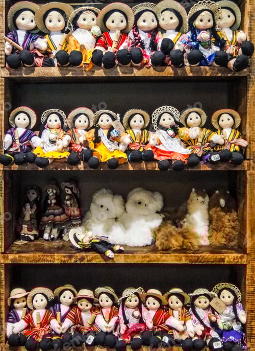 Preview: Typical Ecuadorian Hand Made Dolls In Traditional Clothing Displayed On Indigenous Craft Market
