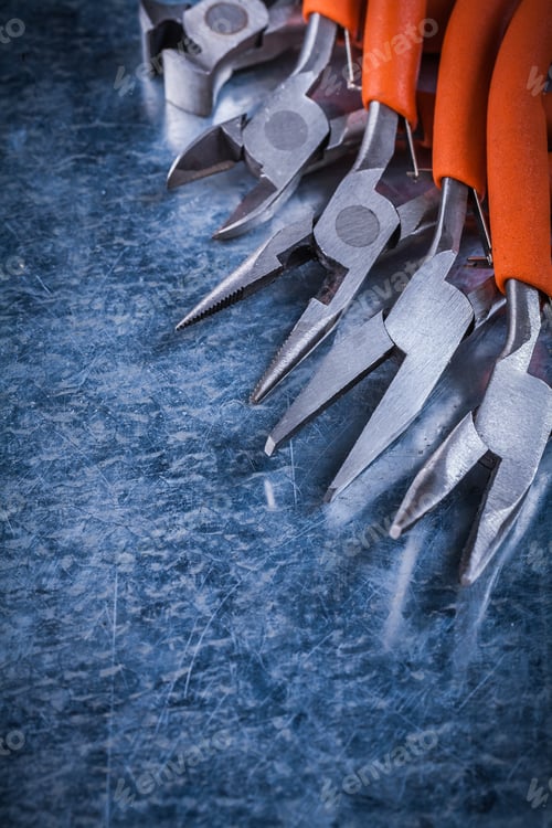 Preview: Group Of Sharp Insulated Electric Gripping Tongs Nippers Vertical Version.