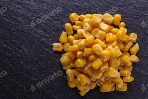 Preview: Canned Corn On A Dark Stone Background