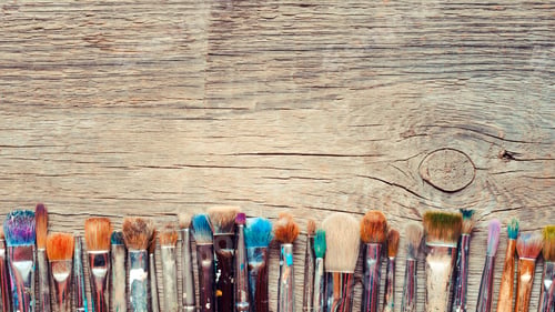 Preview: Row Of Artist Paintbrushes Closeup On Old Wooden Rustic Background