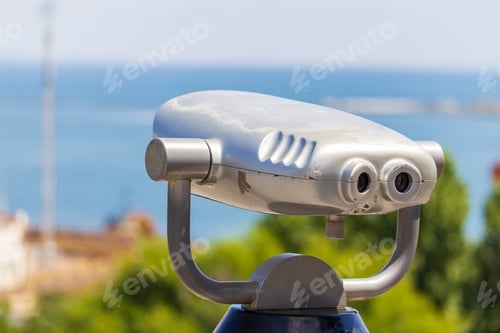 Preview: Binoculars For Tourists On A Blurred Background Of The Sea