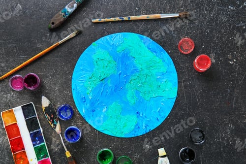 Preview: Painting Of Earth With Painter'S Supplies On Dark Background