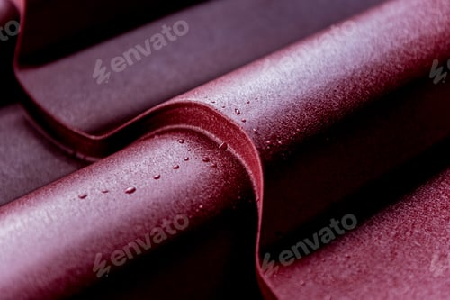 Preview: Red Metallic Roof Tiles Background With Drops Of Water.