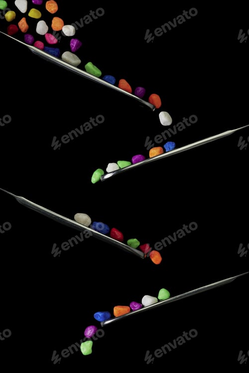Preview: Small Colored Stones On A Black Background