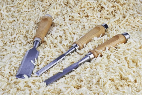Preview: Three Chisels Of Various Widths Lying In Wooden Shavings