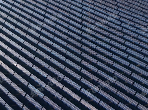 Preview: Aerial Photo Of Solar Power Plant. Many Solar Energy Panels In Countryside From Above.