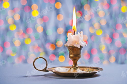Preview: Gloving Candle In Vintage Candlestick On Background Of Bokeh