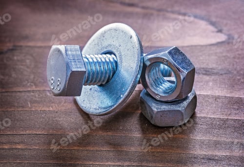 Preview: Collection Of Metal Screw Nut And Bolt Washers On Vintage Wood Board Maintenance Concept