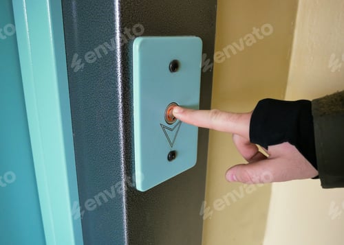 Preview: Finger Presses The Elevator Call Button Close Up
