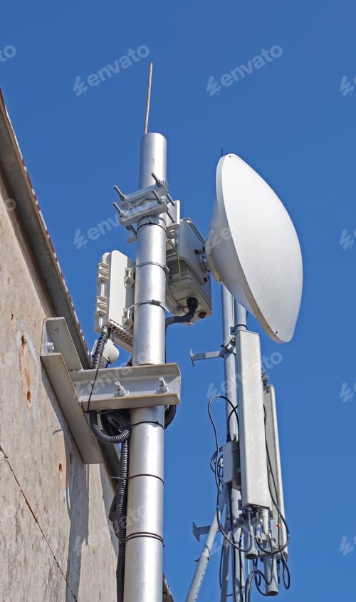 Preview: Tower With Aerials Of Cellular On A Background Blue Sky