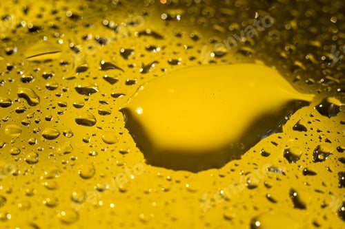 Preview: Yellow Cooking Oil Bubble And Drops On Water For Background.