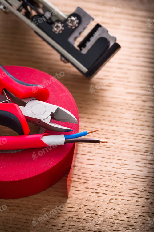 Preview: Electric Cable Nippers Insulating Tape Wire Strippers On Wooden Board