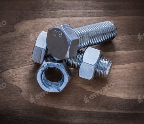 Preview: Bolt Details And Screw- Nuts On Wooden Board Construction Concept.