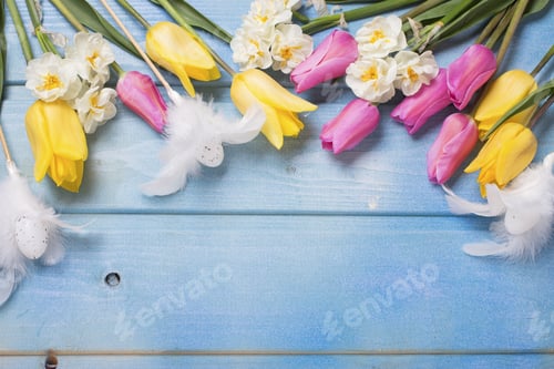 Preview: Easter Background. Pink And Yellow Tulips And White Daffodils Flowers And Eggs With Feathers On