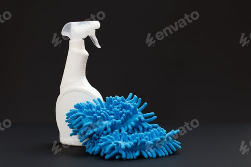 Preview: Plastic Bottle Of Dishwashing Liquid And A Rag On The Black Background. Washing And Cleaning Set.
