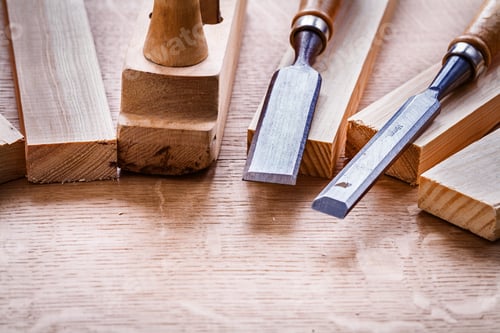 Preview: Chisels And Plane On Planks On Wooden Board