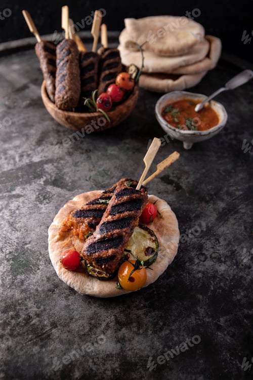 Preview: Traditional Turkish Grilled Shish Kebabs Served With Vegetables, Pita Bread And Home Made Tomato