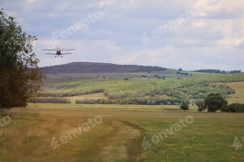 Preview: Classic Old Retro Vintage Airplane With Propeller Approach At The Airfield.