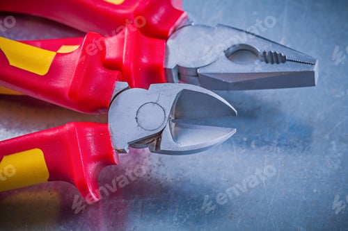 Preview: Pliers Wire Cutter On Metallic Background Horizontal Image Electricity Concept.