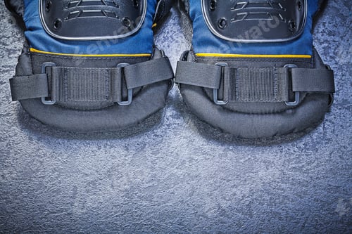 Preview: Pair Of Knee Protectors On Black Background Construction Concept.