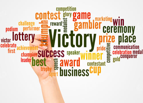 Preview: Victory Word Cloud And Hand With Marker Concept On White Background.