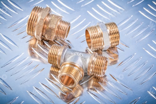 Preview: Brass Hose Nipples Equal Tee On Fluted Metal Sheet Plumbing Concept.
