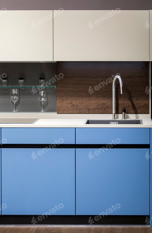 Preview: Beautiful Blue Kitchen Unit, Kitchen Faucet, Wooden Apron In The Kitchen. Modern Minimalistic