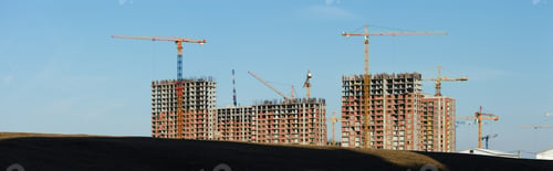 Preview: Panoramic View Of The Construction Of Several Apartment Buildings With Construction Cranes Against