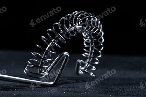 Preview: Metal Whisk On Black Background