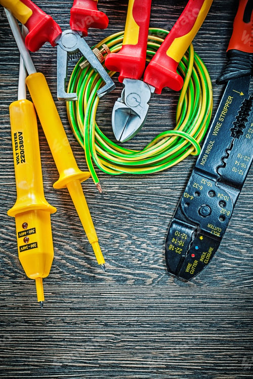 Preview: Electric Tester Cutting Pliers Rolled Cable Insulation Strippers On Wooden Board.