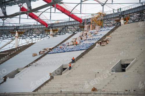 Preview: Stadium Construction. Construction Equipment And Workers On The Construction Of A Football Stadium