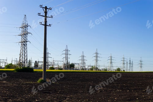 Preview: High Voltage Wires In A Rapeseed Field. Bioenergy Concept