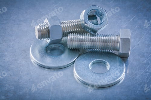 Preview: Horizontal View Of Bolt Washers Screwbolts Screw-Nuts On Metallic Background.