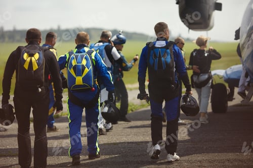 Preview: Team Of Skydivers Heading To The Plane During A Skydiving Competition.