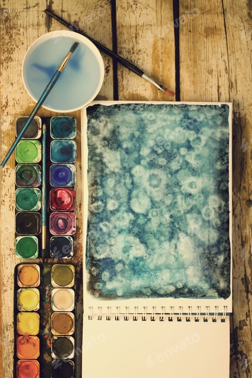 Preview: Watercolor Painting with Brushes and Water on Wood