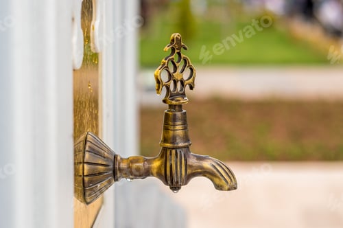 Preview: Close Up Of An Antique Turkish Faucet In The Garden. Old, Historical Water Tap On The Wall.