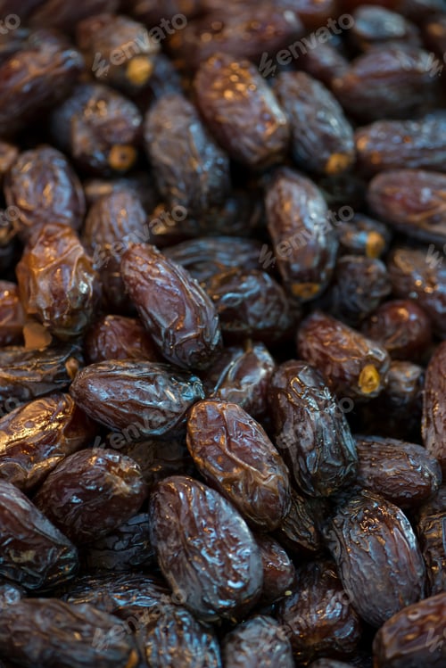 Preview: Pile Of Fresh Dried Date Fruits On A Traditional Craftsman Market. Fruit Background. (Selective