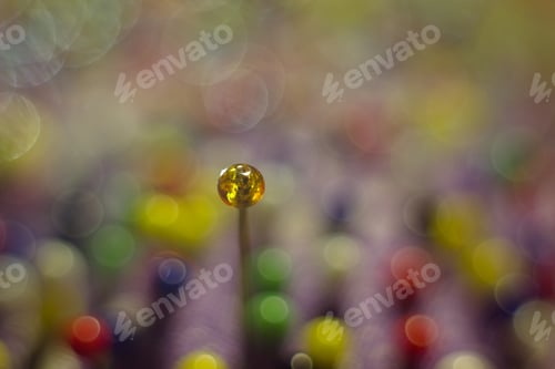 Preview: Color Sewing Pins And Detail Of Reflection For Colored Abstract Background.