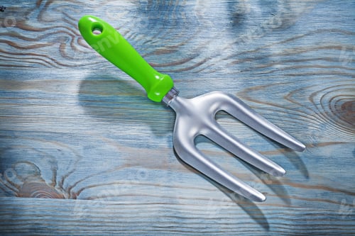 Preview: Stainless Trowel Fork On Wooden Board Gardening Concept.