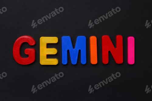 Preview: Gemini Text. Zodiac Sign Written In Bright Multi-Colored Cheerful Letters On A Black Dramatic