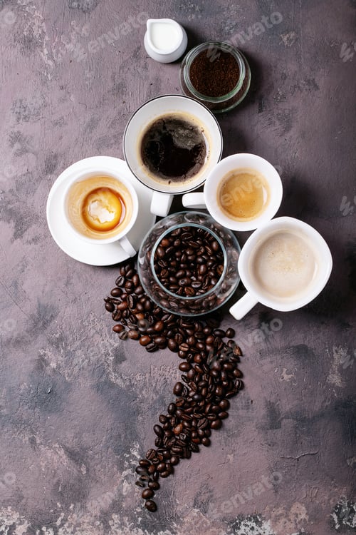 Preview: Fresh Coffee In White Ceramic Cups Over Brown Texture Brown Background. Top View, Flat Lay
