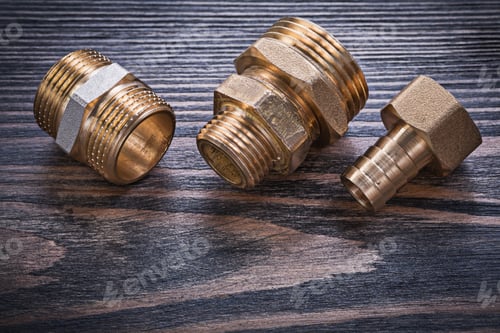 Preview: Brass Hose Nipple Safety Valve On Wooden Background Plumbing Concept.
