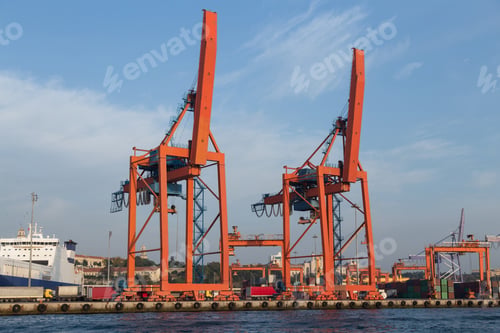 Preview: Orange Port Cranes In A Sea Port