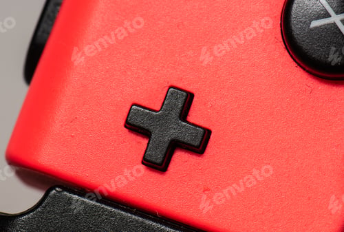 Preview: Black Plus Buttin On A Red Hand Controller