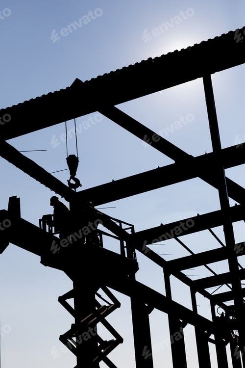 Preview: Silhouette Of The Workers Dissembling Industrial Warehouse. Dissembling Industrial Constructions.